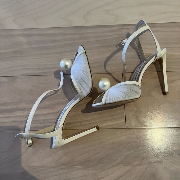 Jimmy Choo
Sacora Tulle Peep-Toe Sandals
35.5 (5.5)
Ivory - Picture 3 of 11